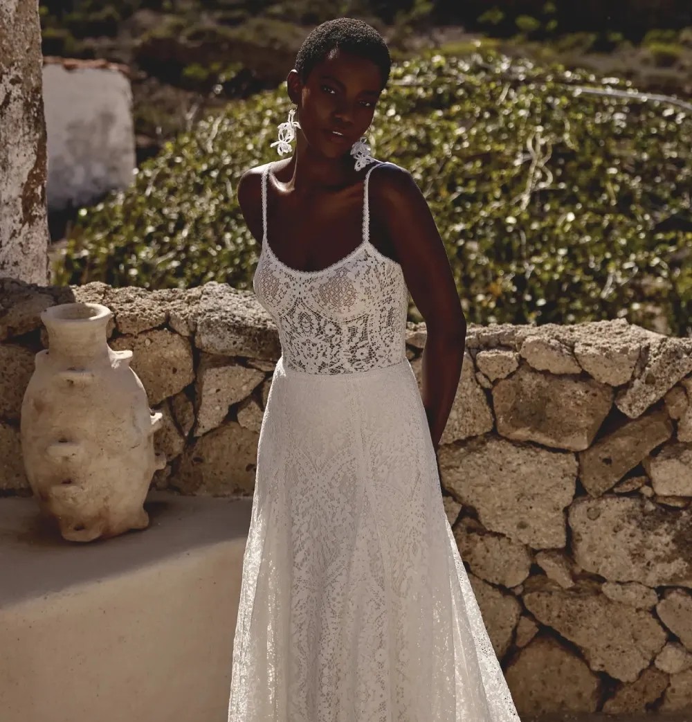 Model wearing a white gown