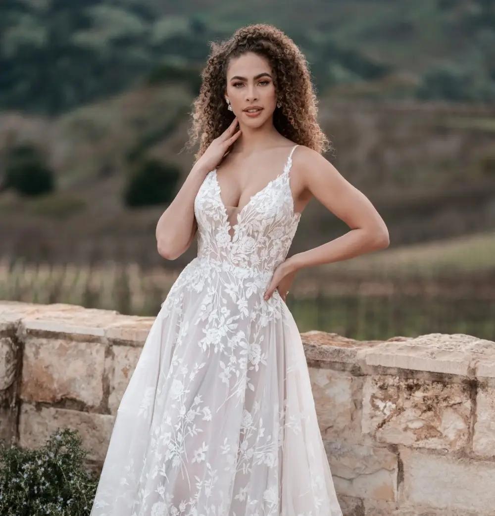 Model wearing a white gown